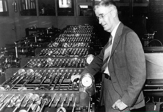 History of Computing Electro-Mechanical Differential Analyzer (1931) Vanevear Bush (1890-1974) A room with a complicated array of gears and shafts driven by electric motors.