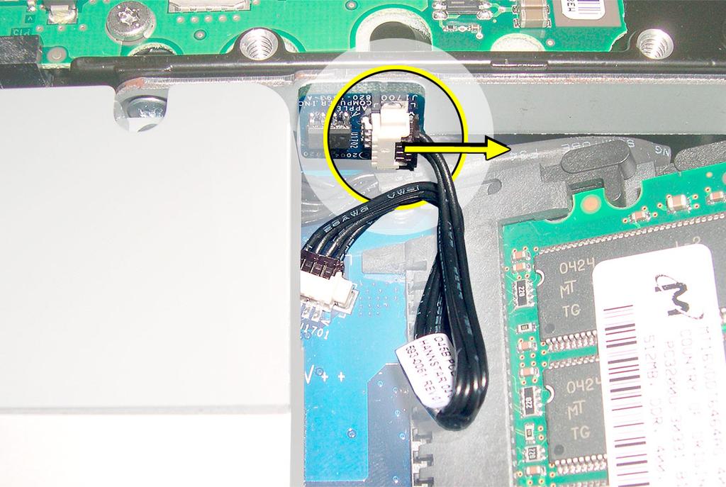 4. Lift the hard drive straight up, about one inch, to access a connector.