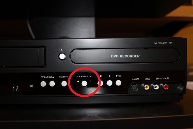 Recording 15.) Press the Source button on the VHS player so that the light underneath VCR is lit. 16.