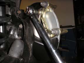 trailing arm (See Pic. 56). Use 15mm socket.