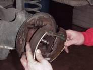 assemblies and remove the drum brake assemblies from the backing
