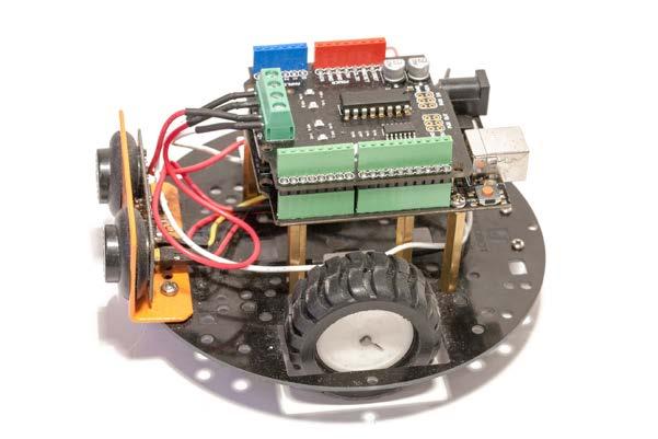 Then, you need to attach the different Arduino boards and shields to the robot.