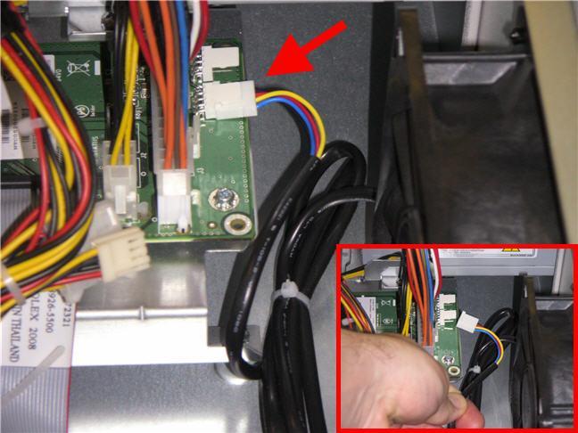 3. Grasp the fan connector at the plug and pull to