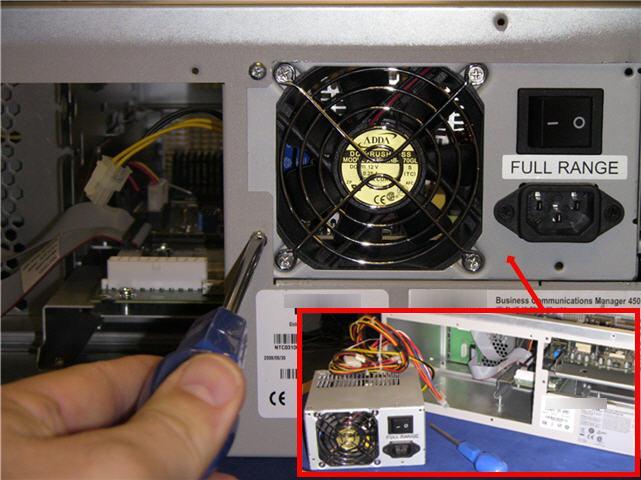3. Once disconnected, remove all associated retaining screws for the power supply at