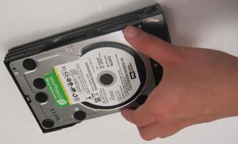5. Carefully insert the hard disk
