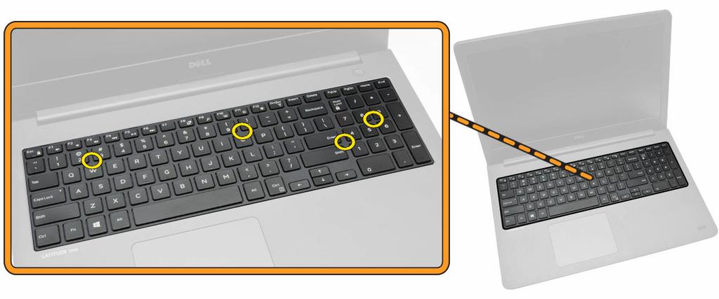 7. Press on the sides of the keyboard followed by the locations marked in the picture to firmly seat