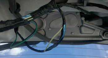 The reverse camera wire is the white/green wire (test with a DMM to verify 12v when the vehicle is shifted into reverse) (Fig B). 3.