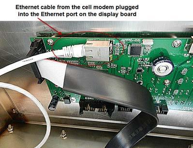 Plug the 5-pin connector from the 3G cell modem power cord into one of the 5-pin connectors on right end of the controller board.