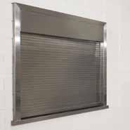 A square hood cover encloses the curtain coil and counterbalance mechanism giving a clean, professional appearance.