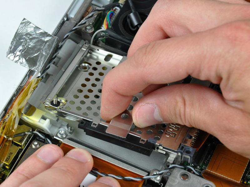 Step 21 When reinstalling your PC card cage, be
