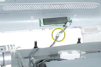 Procedure 1. Remove eighteen hex screws on the rear cover. 2. Lift the rear cover slightly and disconnect the power/brightness switch cable connector, shown below.