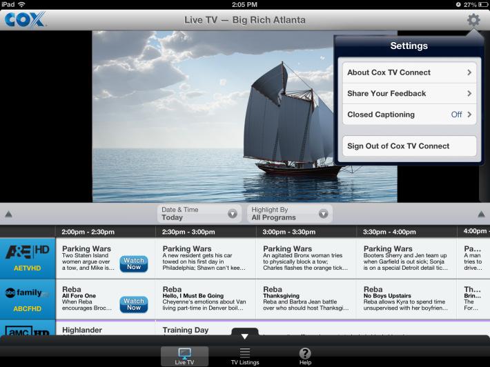 Tap the TV Listings button in the center to see a larger, full-screen view of the program guide.
