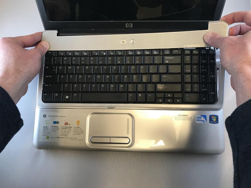 silver cover surrounding the keyboard.