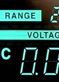 4) Monitor the output voltage on the analog voltmeter or digital VOLTAGE readout and raise the output voltage to your desired voltage by turning