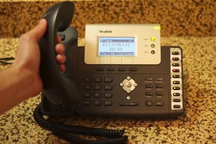 Basic Features Guide This guide will walk you through the basic features and functions of the SpectrumVoIP Phone