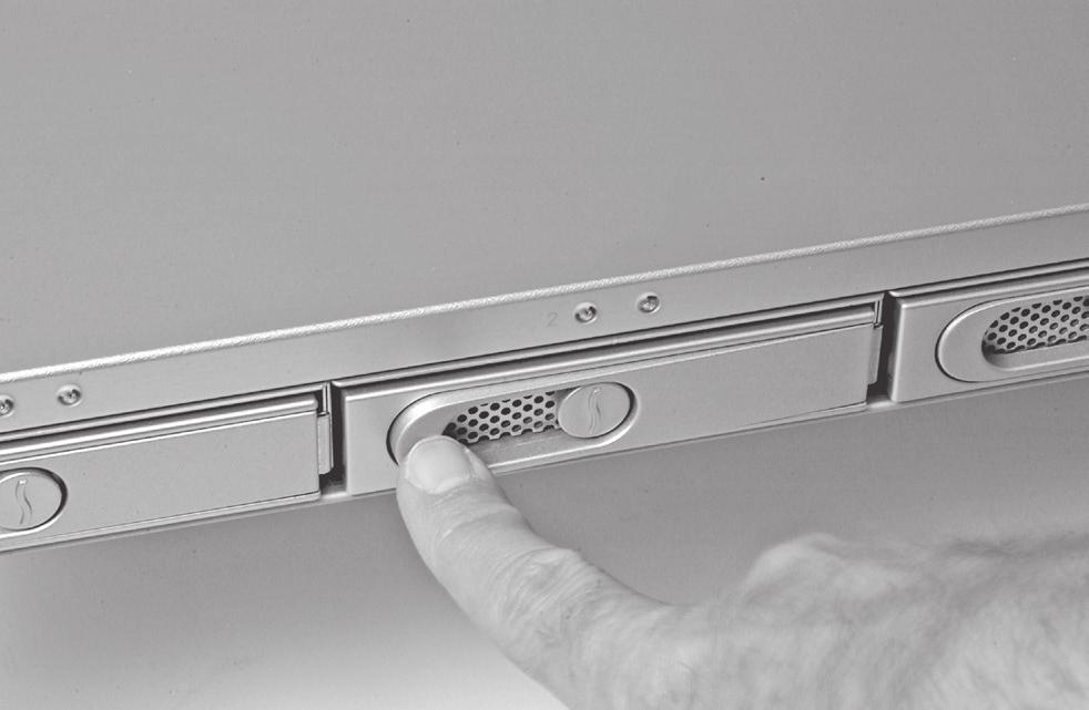 Using four of the supplied screws, secure the drive tray to the drive; tighten each screw to secure the tray snugly to the drive; do not overtighten the screws (Figure 7).