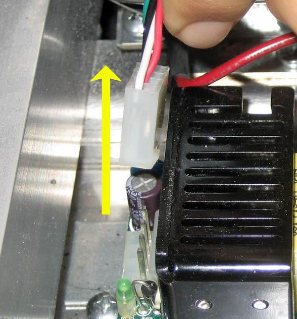 If the LED is not lit, disconnect the four pin cable from the power supply (Fig. 2) to see if the light comes back on. Fig.