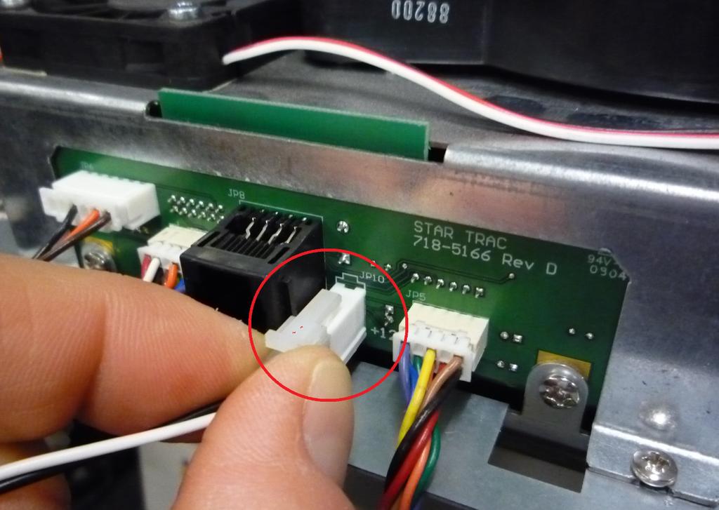 Check if the 2 pin connector (JP10) on the interface board (PN: 718-5166) has a solid connection (Fig. 1 and 2).