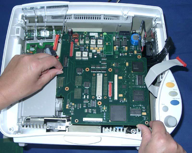 Removing the Main Board 5 Repair and Disassembly 5 Remove the nine screws, pull the main board out of the rack connector and remove the board by moving it towards the bottom of the monitor.