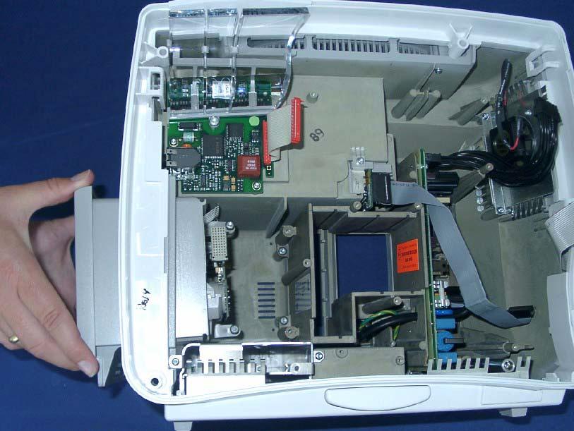 Removing the Power Supply Assembly NOTE When replacing the power supply, the monitor must have the serial number reloaded. A support tool is required to perform this task.