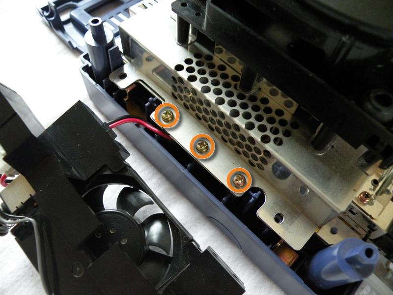 Nintendo GameCube Lens Recalibration Step 5 Removing the optical drive main screws Locate