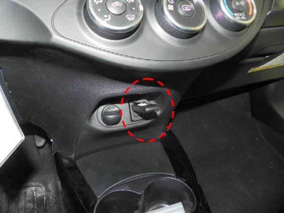 8. Perform a USB Function Test. (a) Connect the USB flash drive media to the vehicle s USB/AUX connector in the center console (Fig. 8-1).