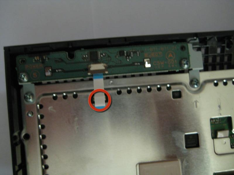 Step 22 Remove the ribbon cable attaching