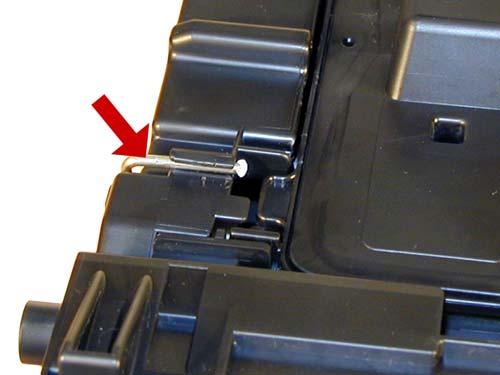 Figure 33 18) On the gear side only, take the Xacto knife with the chisel blade, and cut