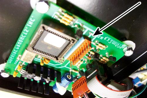 The circuit board mounted on the cover plate is where the pins are located, which will require the jumper.