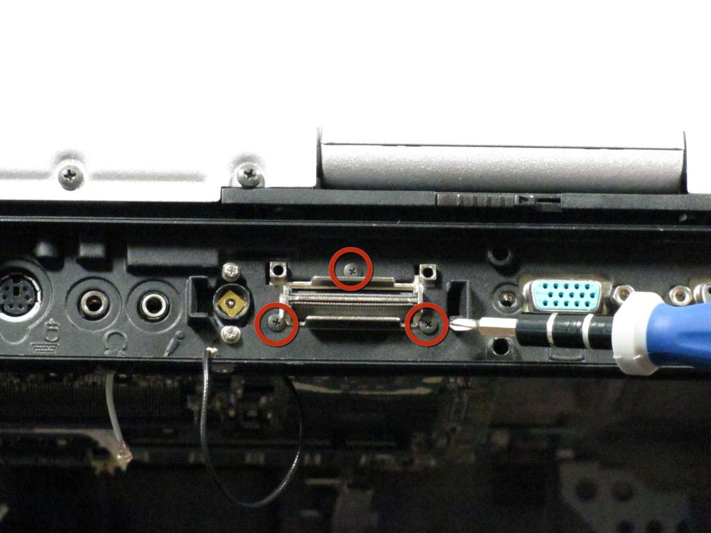 screws surrounding the serial port.