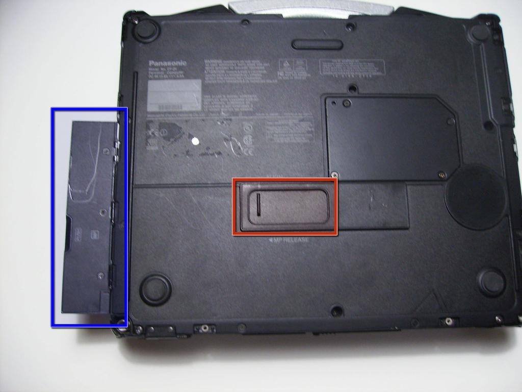 Step 5 Optical Drive Flip the device upside down with the handle facing away