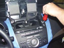 Mounting Screws Carefully remove 2 x phillips radio mounting screws on