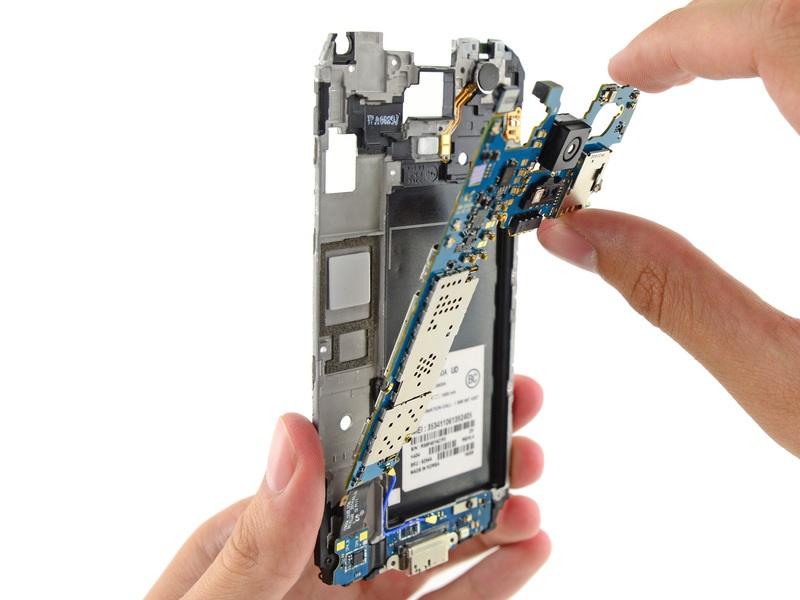 Do not attempt to fully remove the motherboard as it is still attached to the interior midframe