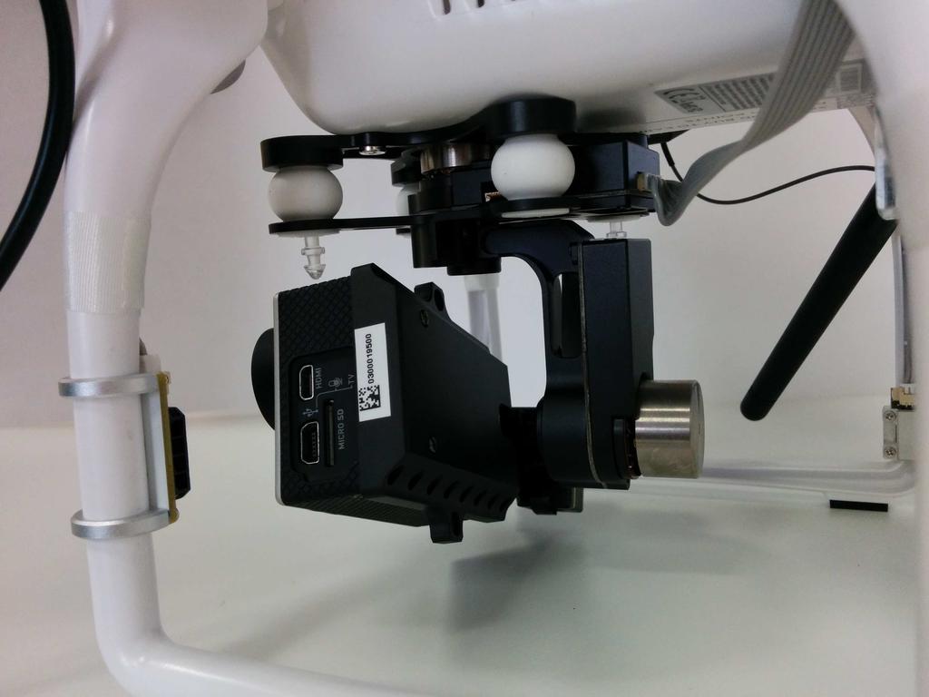 To reconnect your gimbal, pinch the rubber tension grommets back into place and reattach the ribbon cable. Be sure to attach the anti-drop pins before flying with your gimbal installed. 11.