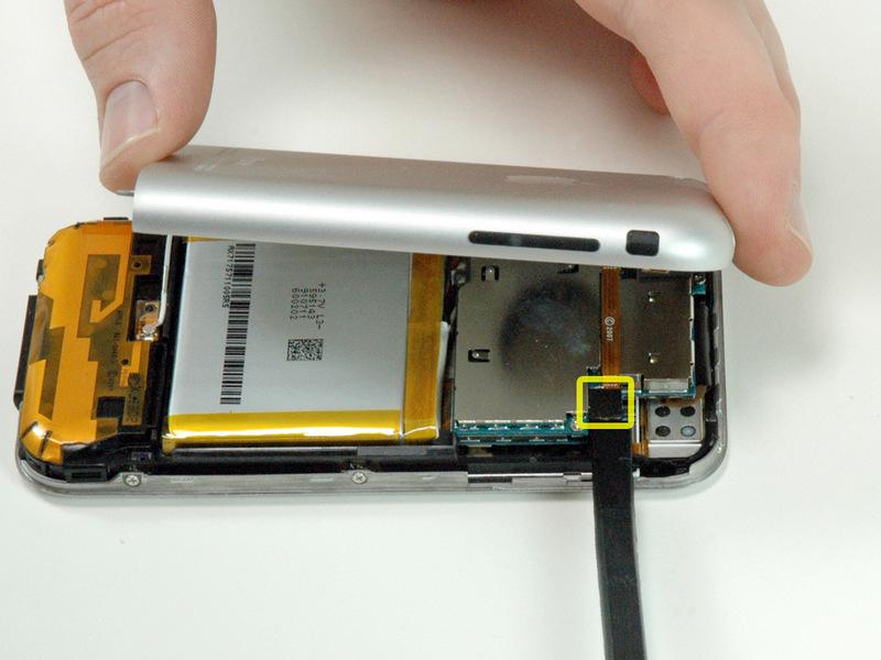 The rear panel is still attached to the iphone by the headphone jack cable, so don't entirely remove the rear panel from the iphone just yet.