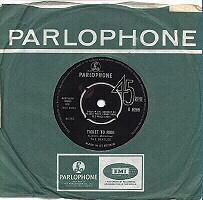 The first of the "green" sleeves, which accompanied Parlophone singles from mid 1963 until about mid 1965, has a lone Parlophone logo at the bottom.