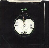 The last few Beatles singles for Apple were issued in the newer "thumb tab" sleeves.