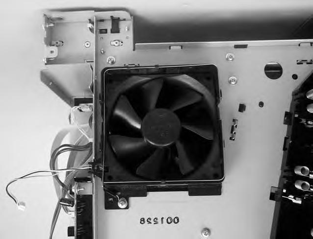3. Remove one screw (callout 2) to release the fan.