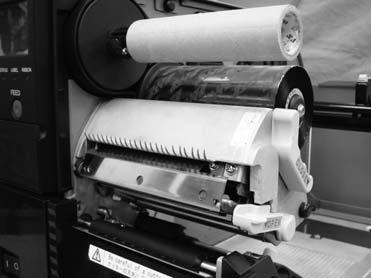 The printer head will open. Do as described in Step 2 of Setting roll paper. 3 Put in a carbon ribbon in the ribbon feeder.