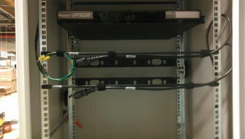 Attach the Fiber Switch-A AC cable to the UPS. The plug is Tak-Ty just above the UPS. The cords are shown in Figure 11. 59.