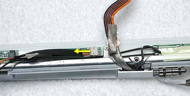 Replacement Note: When installing the replacement reed switch board and cables, use new tape to bundle the cables