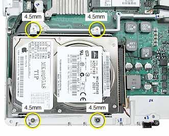 4. Remove the four identical screws at the hard drive bracket. 5.