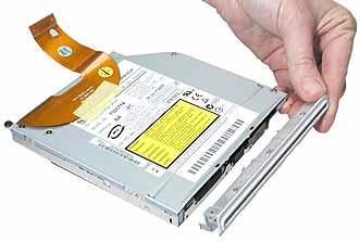 Replacement Note: When installing the replacement optical drive, align the front of the drive bezel to the outer edge