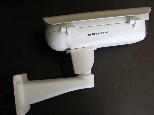 Run the Ethernet cable and outside power cable (if necessary) through the wall mount. 3. Install the HSG2 housing onto wall mount as shown in image 11.