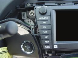dash trim on left side of radio Remove Left Side Radio Bolts Remove 2 x 10mm mounting bracket
