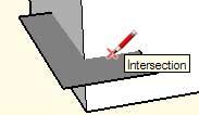 The following image shows the drawing axes in SketchUp (the lines have been thickened to make the axes easier to read). The black circle represents the origin.
