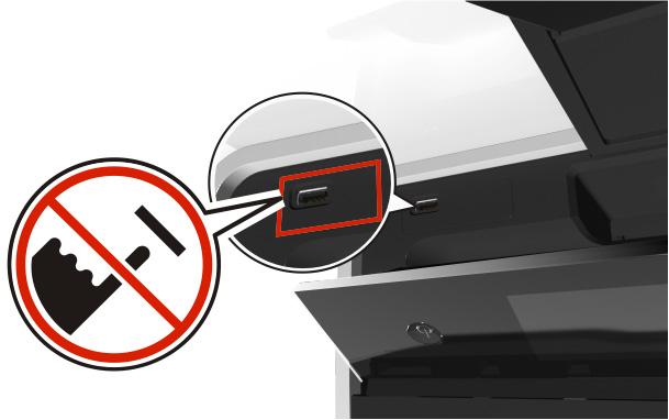 Notes: The flash drive uses the same port that is used for a PictBridge camera cable. An adapter may be necessary if your flash drive does not fit directly into the port.