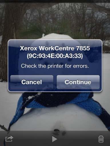 I submitted a print job from my Apple device to a Xerox device via AirPrint, but I am getting a message on my Apple device that says Check the printer for errors. What is going on?