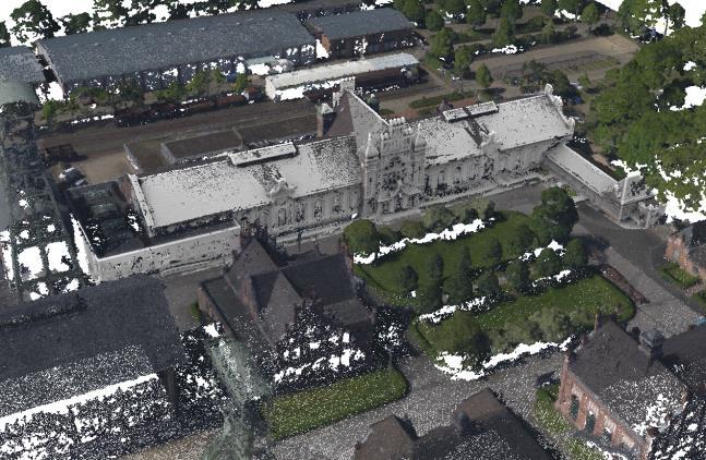Coloured point cloud from software PhotoScan with overlaid TLS point cloud Lohnhalle in grey Figure 6 shows the TLS reference point cloud for the building Lohnhalle in grey and additionally
