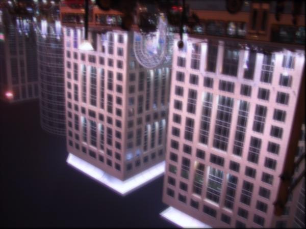 4 and 7 respectively. In Fig. 8, we show a night-view deblurring example. The transparency is computed on the building boundary. We restore the input image using the LucyRichardson method. In Fig. 9, an object motion deblurring example is shown.